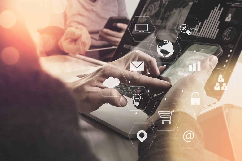 co working team meeting concept,businessman using smart phone and laptop and digital tablet computer in modern office with virtual interface icons network diagram