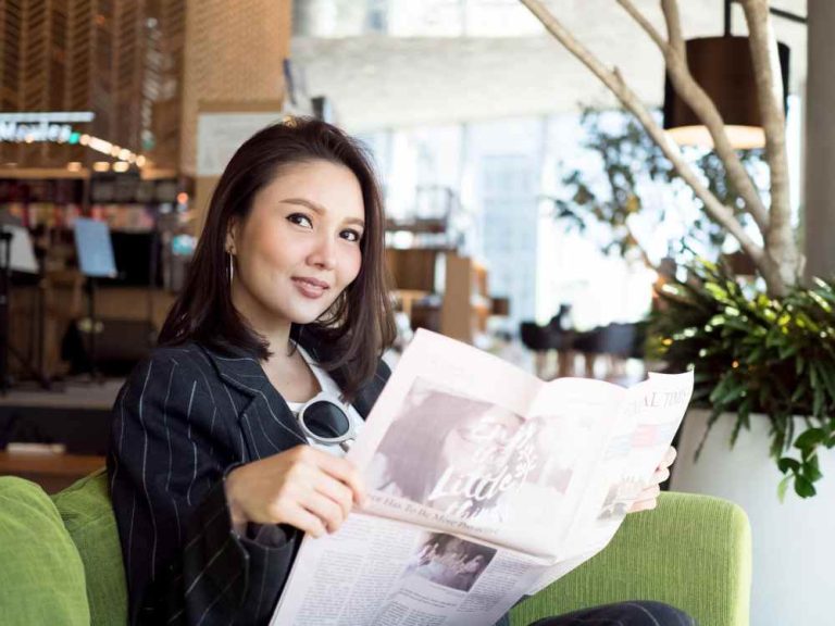 A woman reading press release (illustration)